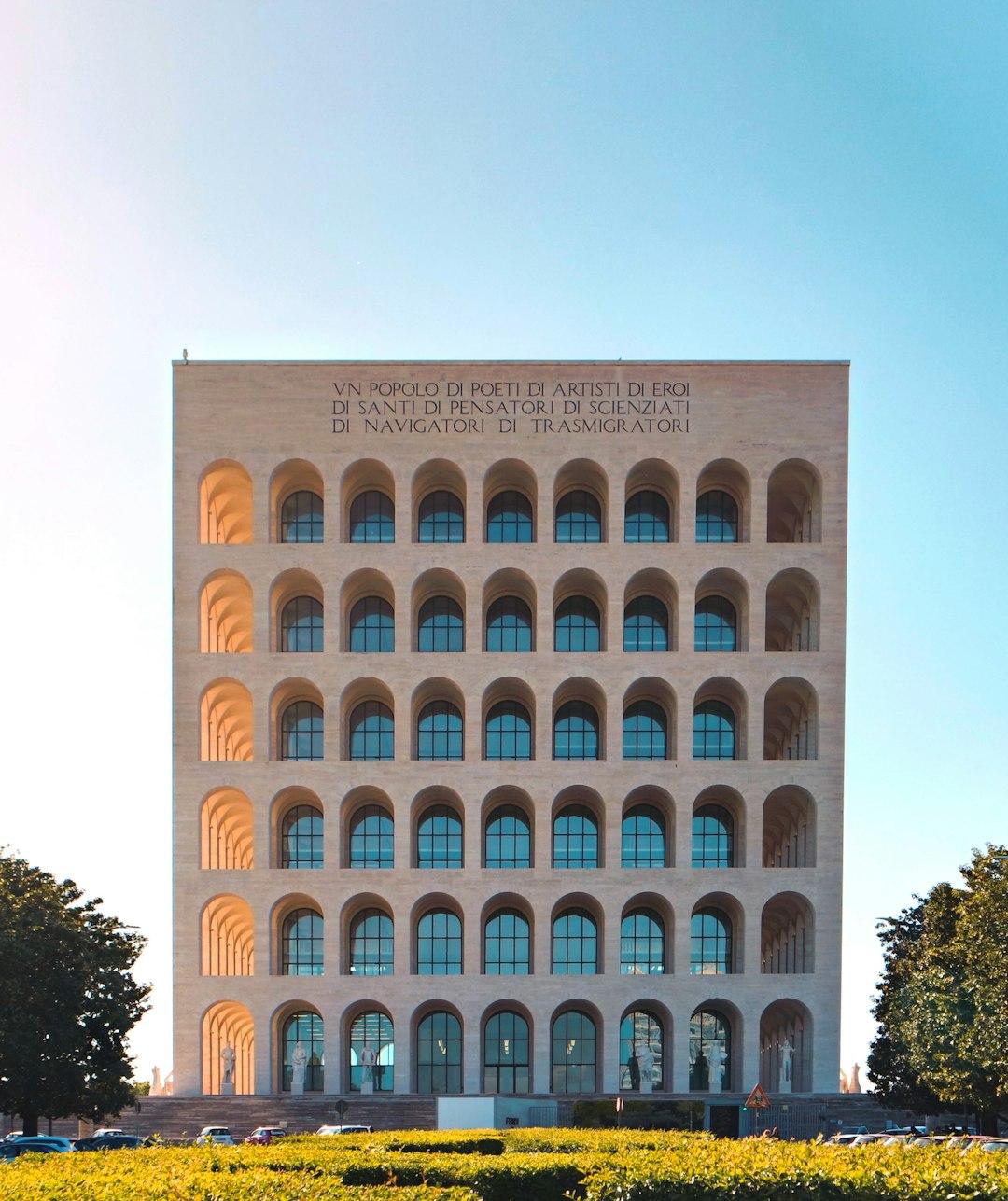 Roma Eur building during daytime by Michele Bitetto